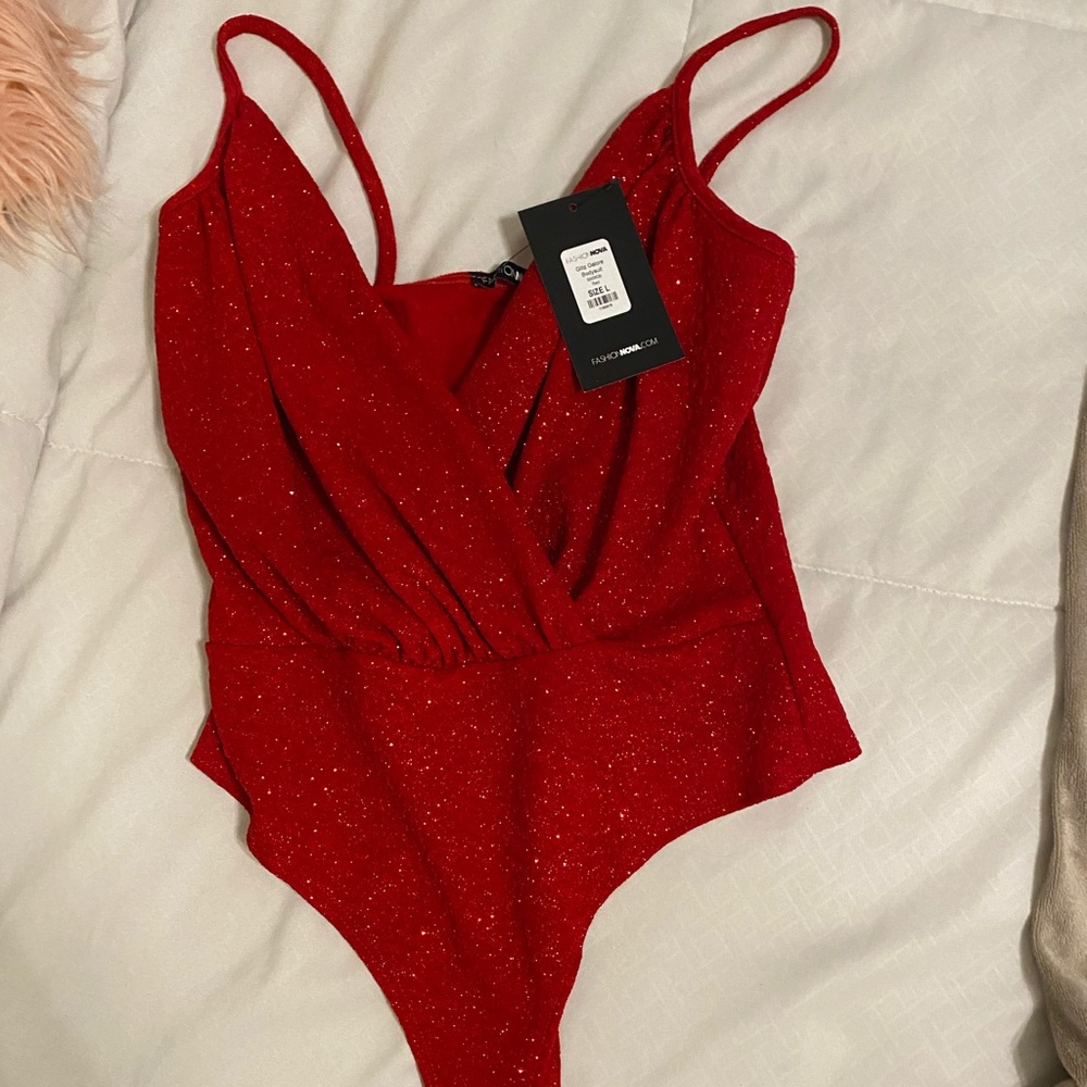 red glitter body suit NWT